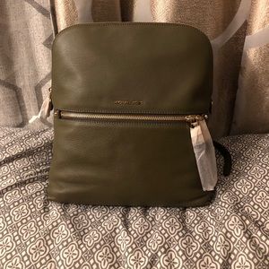 MICHAEL KORS
Rhea Medium Pebbled Slim Backpack